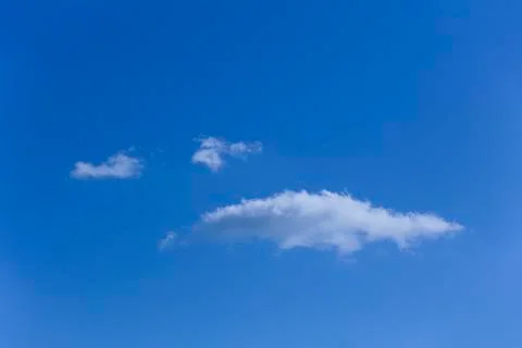 White fluffy clouds in the sky. 스톡 사진