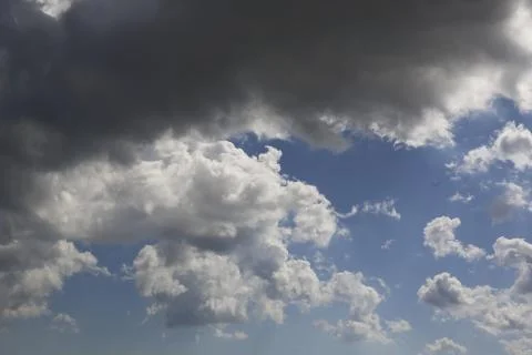 White fluffy clouds in the sky. Фото