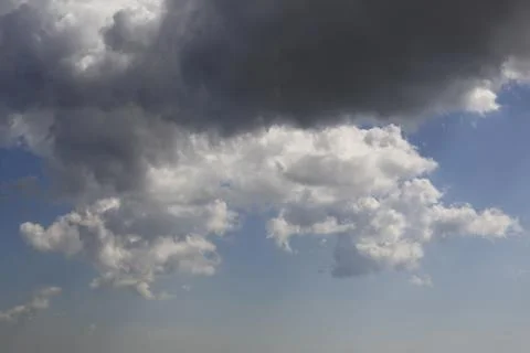 White fluffy clouds in the sky. Stock Photos