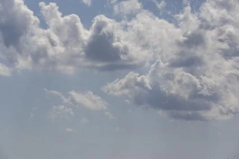 White fluffy clouds in the sky. 写真素材
