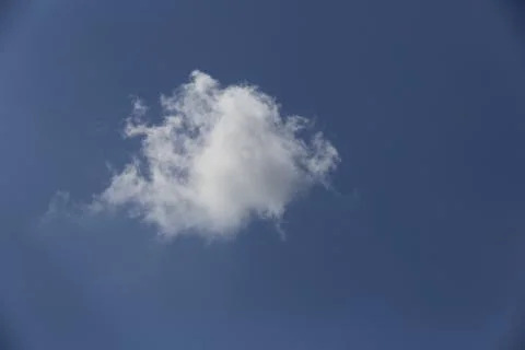 White fluffy clouds in the sky. Stock Photos