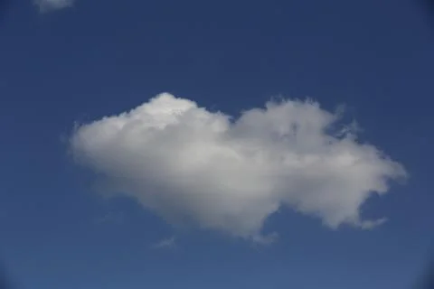 White fluffy clouds in the sky. Stock Photos