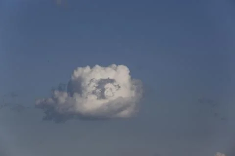 White fluffy clouds in the sky. Stock Photos