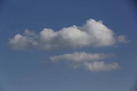 White fluffy clouds in the sky. 스톡 사진