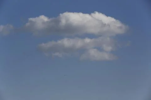 White fluffy clouds in the sky. Stock Photos