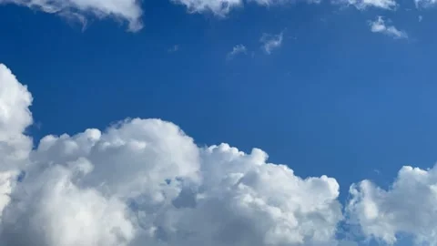 White Fluffy Clouds In Sunny Sky 4K Timelapse Stock Footage 182155877