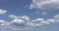White fluffy cumulus clouds. Light time lapse. HD Footage