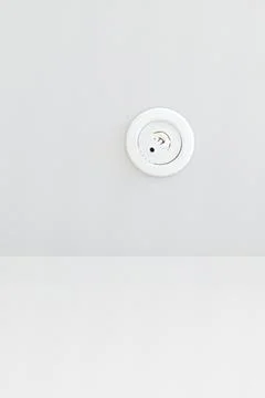 White flush mount fire sprinkler head with copy space Stock Photos