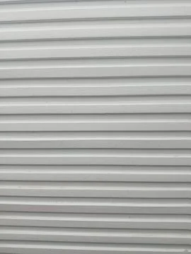 White Fluted Wall Panel Texture - Modern WPC Ribbed Panel Background Stock Photos
