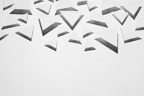 White flying triangles geometric pattern in hard light with strict black shad 写真素材