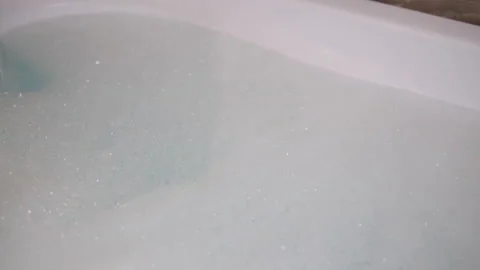 White Foam With Bursting Bubbles. Turquoise water. Time to take a bath. 4k Stock Footage 147036745