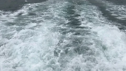 White foam coming out of the back of the ship Stock Footage 145288110