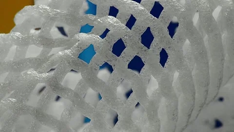 White foam net on blurry background Stock Footage 303500624