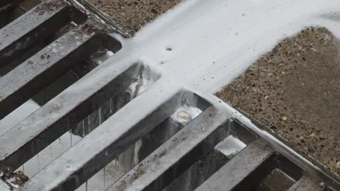 White foam polluting a storm drain Stock-Footage 310408691
