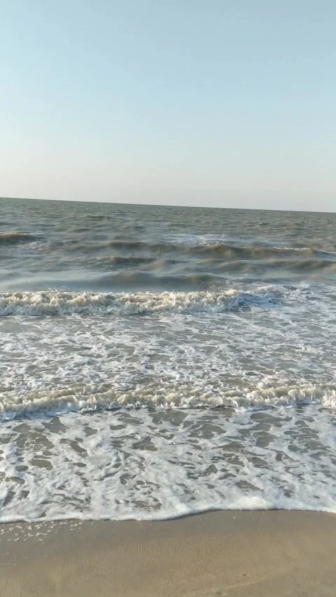 White foam is produced from sea waves Stock Footage 283911972