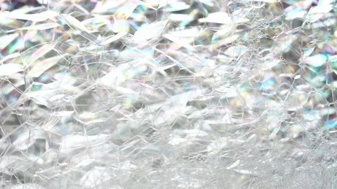 The white foam from soap bubbles grows and increases in size. abstract texture 動画素材 234142279
