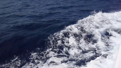 White foam trail in the dark sea from a speedboat-4 Stock Footage 80491633