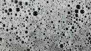 White Foam On Water Multiplies With Big Bubbles Stock Footage