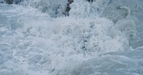 White Foaming Water in Mountain River Video stock 169894886