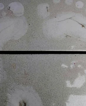 White Footprints On Gray Volcanic Ash Dust Covering Floor Tiles Fotos Stock
