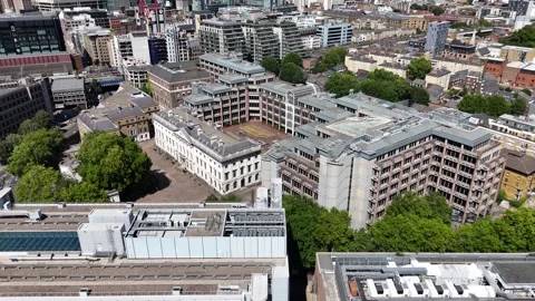 White Former Royal Mint Building Among Modern Offices Vídeos de archivo 343467776