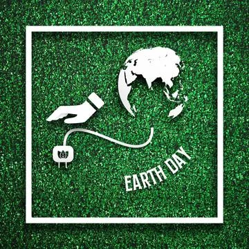 White frame with had unplugging from the earth as energy saving concept on... Stock Photos