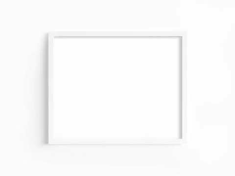 White frame with landscape orientation on a light wall. Foto stock