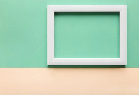 White frame on mint background Stock Photos