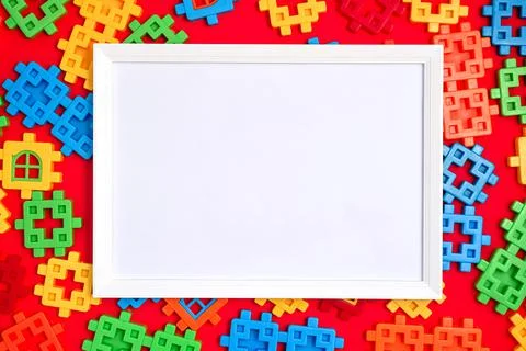 White frame mockup on Bright background texture from multi-colored plastic Stock Photos