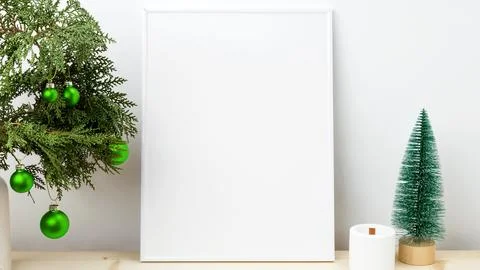 White frame for mockup with thuja branches with Christmas ornaments Stock Photos