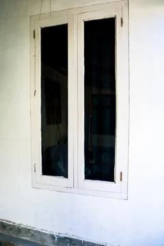White Framed Double Window on Off White Wall Stock Photos