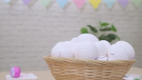 White fresh raw chicken eggs rotating in basket. Happy easter. Painting eggs Video stock 234988692