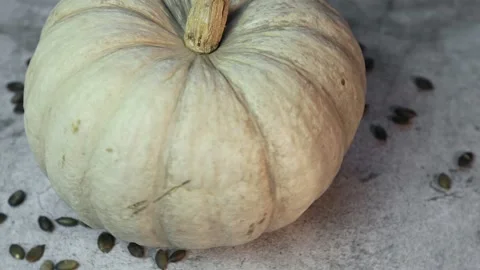 White fresh whole pumpkin close-up. Rotating food fruits vegetables Stock Footage 164849106