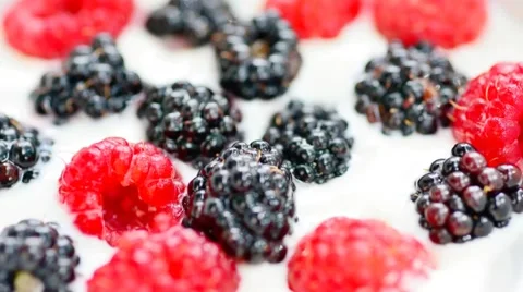 White fresh yogurt with raspberries and blackberries.  動画素材 59346286