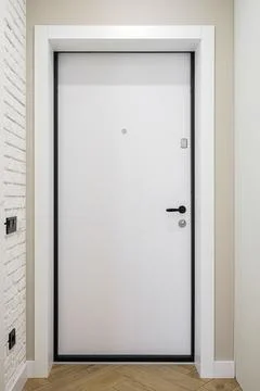 White front door inside the house Stock Photos