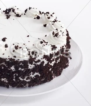 White Frosted Cake with Chocolate Crumbs Stock Photos