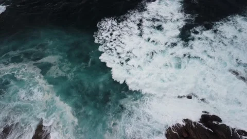White Frothy Ocean Waves Rushing Over Rugged Coastline In Caion Beach Stock Footage 236643225