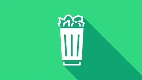 White Full trash can icon isolated on green background. Garbage bin sign Stock Footage 147159456