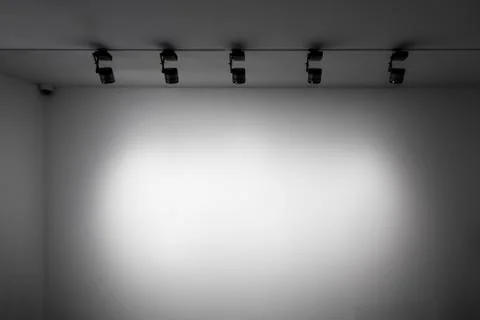 White gallery wall with lights Stock Photos