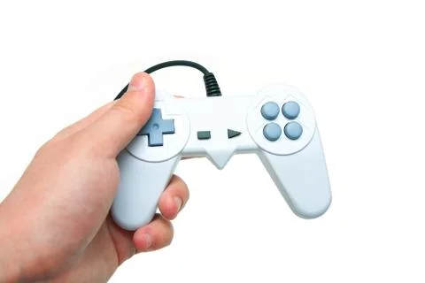 White game controller in hand Stock Photos