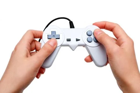 White game controller in hands Stock Photos