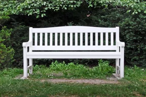 A white garden bench Stock Photos