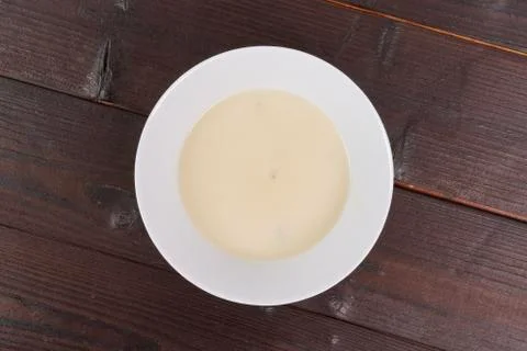 White garlic soup on a table Foto stock
