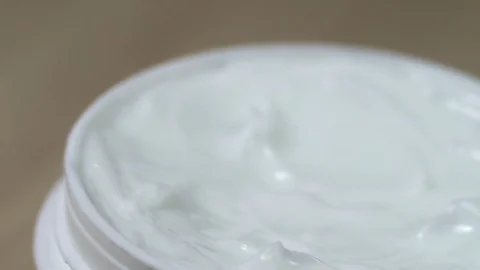White gentle cosmetic cream Fingered,macro closeup Stock Footage