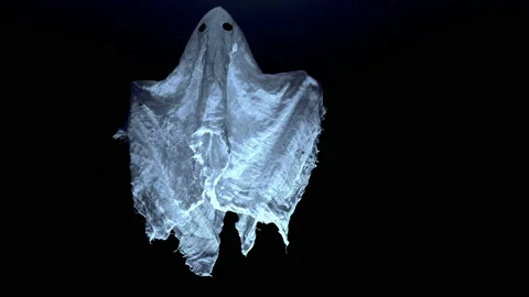 A white ghost made of fabric floating at night under the ceiling close-up Stock Footage 227326867