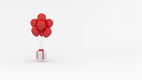 White gift box hanging on red balloons 库存影片 93691404