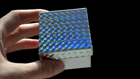 White gift box with rainbow scotch cover in hand, DIY idea, on black background Stock Footage 106301295