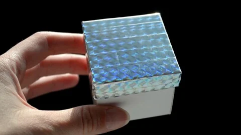 White gift box with rainbow scotch cover, DIY idea, the box is opened by hand Stock Footage 106301366