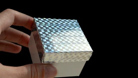 White gift box with rainbow scotch cover in hand, DIY idea, just showing Stock Footage 106301396