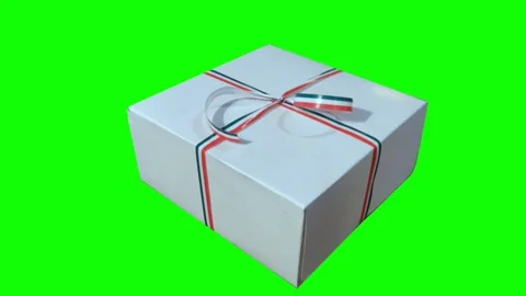 White gift box with red ribbon on green screen background Stock Footage 320815336